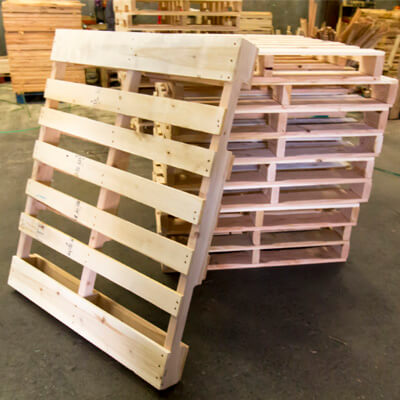A stack of wooden GMA grade pallets.